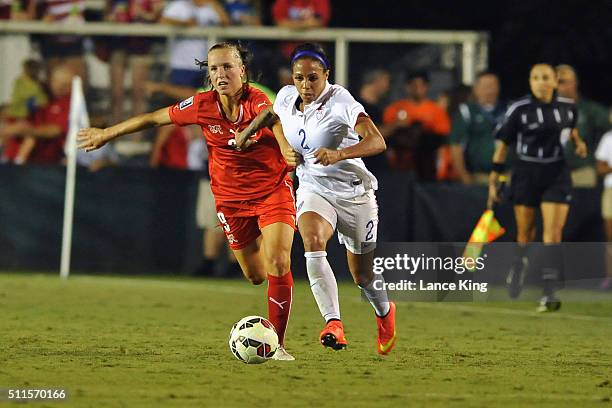 Sydney Leroux of the U.S. Women's national team in action against Lia Walti of the Swiss women's national team at WakeMed Soccer Park on August 20,...