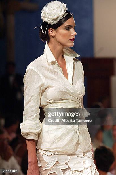 Model walks the catwalk at the Sylvia Tcherassi fashion collection at The Mir Foundation Fashion Show and Gala At La Romana August 8, 2004 at Casa De...