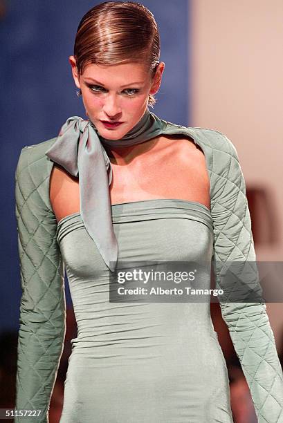 Model walks the catwalk at the Sylvia Tcherassi fashion collection at The Mir Foundation Fashion Show and Gala At La Romana August 8, 2004 at Casa De...