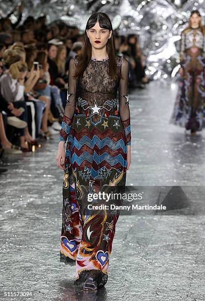 Model walks the runway at the Mary Katrantzou show during London Fashion Week Autumn/Winter 2016/17 at Central Saint Martins on February 21, 2016 in...