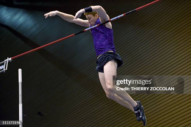 Shawn Barber of US places second as he clears the bar at 5,91m altitude during the first edition of the All-star pole vault competition in...