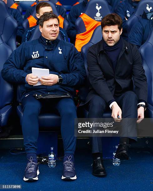 Mauricio Pochettino , Manager of Tottenham Hotspur talks with first team coach Miguel D'Agostino during the Emirates FA Cup Fifth Round match between...