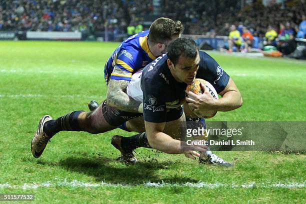 Kane Linnett of North Queensland Cowboys crosses over to score his team a try during the World Club Series match between Leeds Rhinos and North...