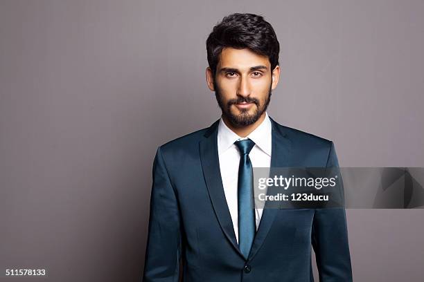 middle eastern businessman - handsome muslim men stock pictures, royalty-free photos & images