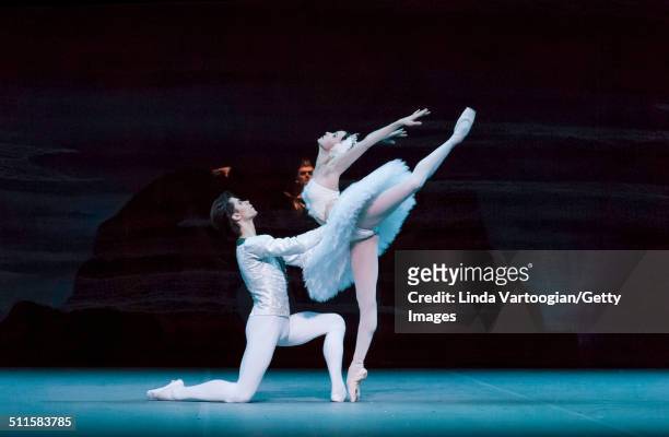 Russian dancers Artem Ovcharenko and Anna Nikulina perform during Act I in the Bolshoi Ballet production of 'Swan Lake' during the Lincoln Center...