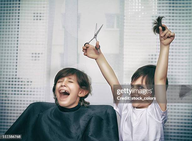 help me from this crazy little hairdresser - bad brother stock pictures, royalty-free photos & images