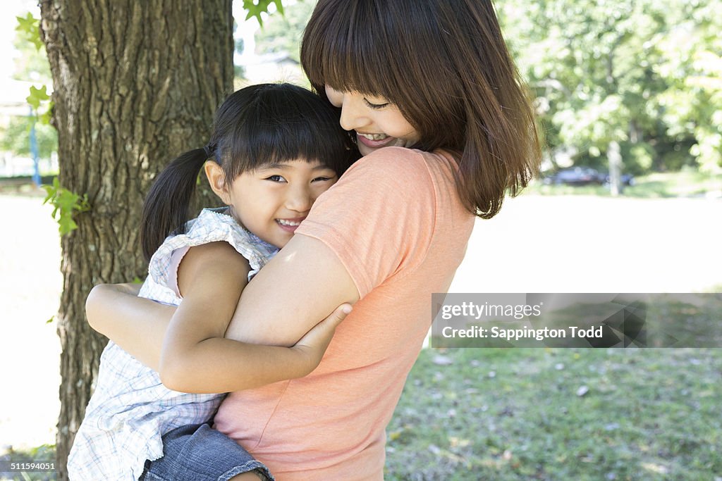 Mother And Daughter Hugging