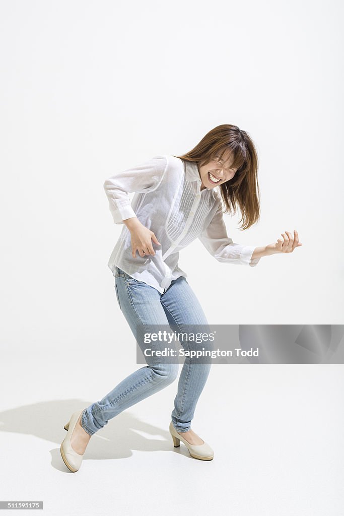 Woman Posing Like Playing Guitar