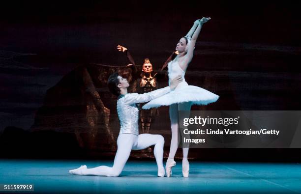 Russian dancers Artem Ovcharenko and Anna Nikulina perform during Act I in the Bolshoi Ballet production of 'Swan Lake' during the Lincoln Center...