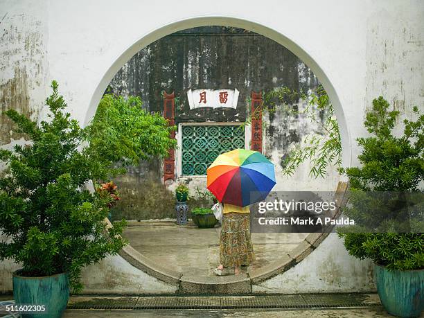 circles and umbrella - macao stock pictures, royalty-free photos & images