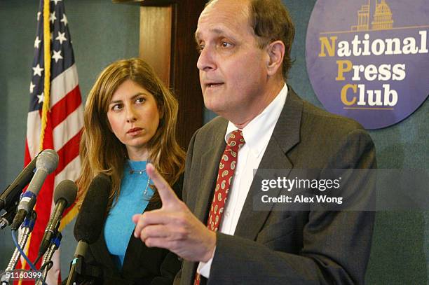 Tamara Chalabi , daughter of former Iraqi governing council member Ahmad Chalabi, looks at family attorney John Markham as he answers questions from...