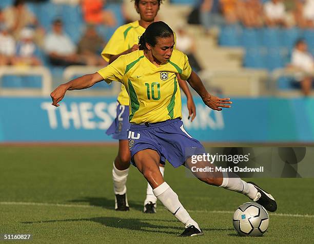 Marta for Brazil scores a goal against Australia in the women's football preliminary match on August 11, 2004 during the Athens 2004 Summer Olympic...