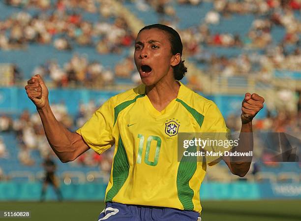 Marta for Brazil celebrates a goal against Australia in the women's football preliminary match on August 11, 2004 during the Athens 2004 Summer...