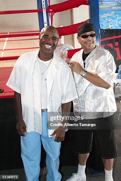 Boxer Glen Johnson and actor Ice-T pose at the Fight Club where a press conference was held to promote Glen Johnson's upcoming IBF Light Heavyweight...