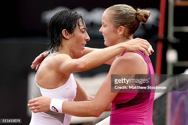 Francesca Schiavone of Italy is congratulated by Shelby Rogers of the United States after the final during the Rio Open at Jockey Club Brasileiro on...