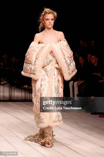 Model walks the runway at the Alexander McQueen show during London Fashion Week Autumn/Winter 2016/17 at Royal Horticultural Society on February 21,...