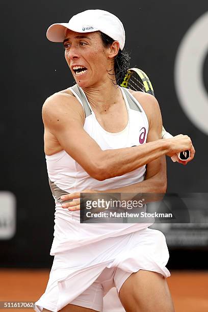 Francesca Schiavone of Italy returns a shot to Shelby Rogers of the United States during the final of the Rio Open at Jockey Club Brasileiro on...