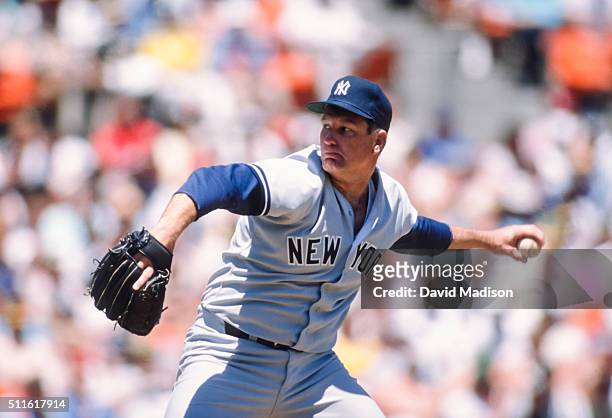 Tommy John of the New York Yankees pitches in a Major League Baseball game against the Oakland Athletics played on May 18, 1989 at the...