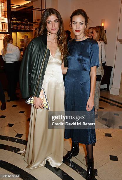 Elisa Sednaoui-Dellal and Alexa Chung attend as mytheresa.com and Burberry celebrate the new MYT Woman at Thomas's on February 21, 2016 in London,...