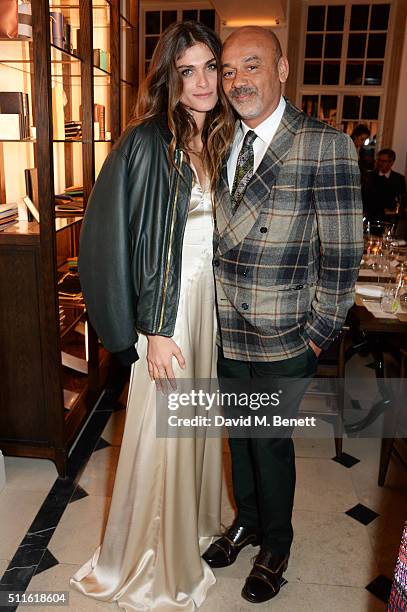 Elisa Sednaoui-Dellal and Christian Louboutin attend as mytheresa.com and Burberry celebrate the new MYT Woman at Thomas's on February 21, 2016 in...