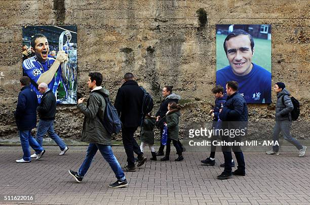 Fans walk past images of former Chelsea players Frank Lampard and Ron Harris outside the stadium before the Emirates FA Cup match between Chelsea and...