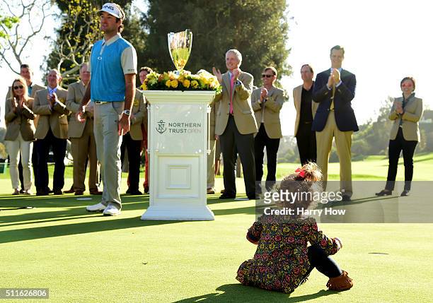 Bubba Watson's daughter Dakota watches during the trophy presentation on the 18th hole during the final round of the Northern Trust Open at Riviera...