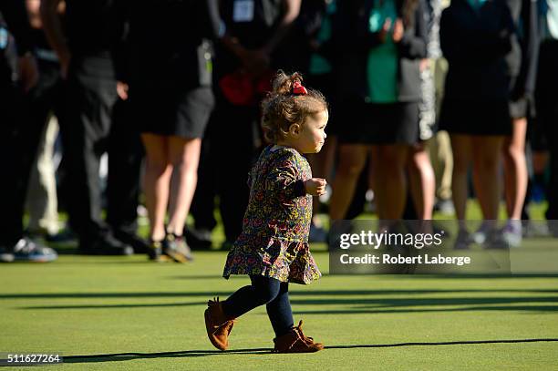 Bubba Watson's daugter Dakota Watson looks on during the trophy ceremony after the final round of the Northern Trust Open at Riviera Country Club on...