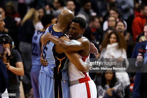 Memphis Grizzlies guard Vince Carter and Toronto Raptors guard Kyle Lowry hug each other after their NBA game at the Air Canada Centre in Toronto,...