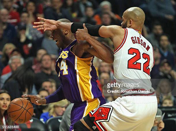 Kobe Bryant of the Los Angeles Lakers moves against Taj Gibson of the Chicago Bulls at the United Center on February 21, 2016 in Chicago, Illinois....