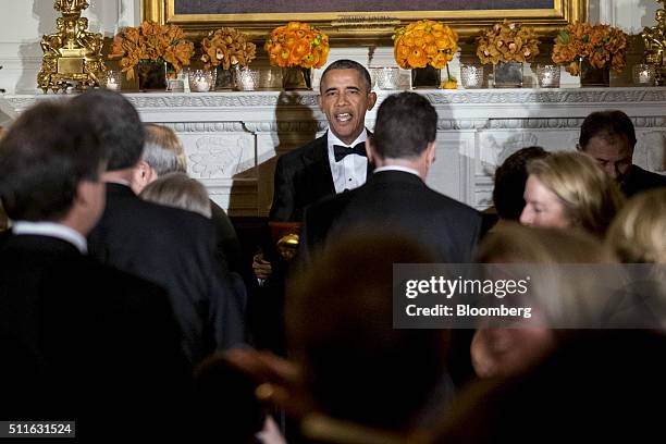 President Barack Obama speaks during a National Governors Association dinner and reception in the State Dining Room of the White House in Washington,...