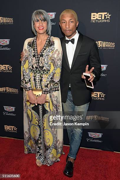 Musician Pharrell Williams and Mimi Valdes attend the 2016 ABFF Awards: A Celebration Of Hollywood at The Beverly Hilton Hotel on February 21, 2016...