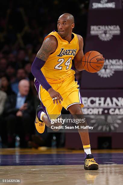 Kobe Bryant of the Los Angeles Lakers dribbles the ball during the second half of a game against the San Antonio Spurs at Staples Center on February...