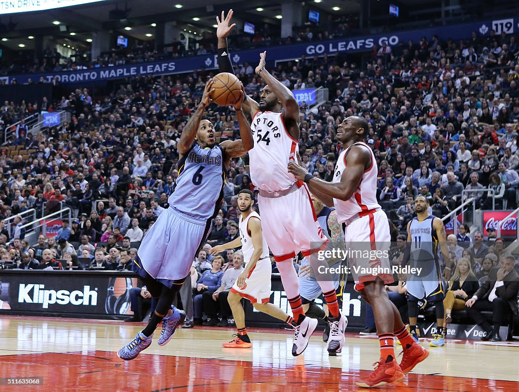 Mario Toronto Raptors Mario Chamlers of the Memphis Grizzlies shoots the ball as Patrick ...