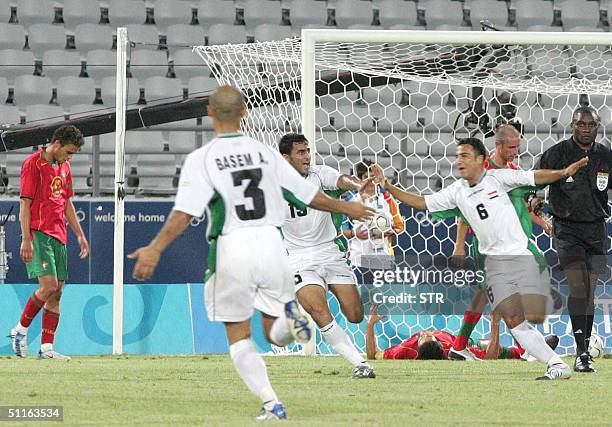 Sadir Salih celebrates shooting the 4th goal against Portugal during their Group D Olympic match in the Pampeloponnisiako Stadium in Patras, west of...