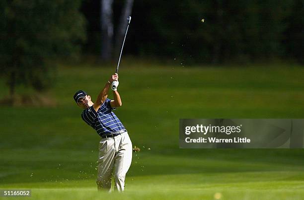 Kariem Baraka of Germany plays his second shot into the seventh green during the second round of the BMW Russian Open at Moscow Golf and Country Club...