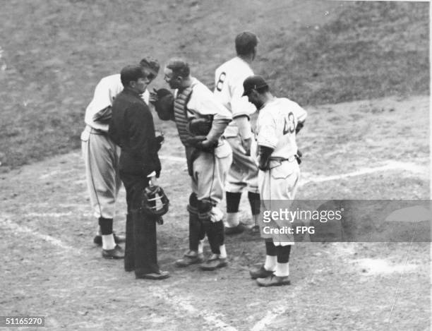 Chicago Cubs catcher Gabby Hartnett argues with Umpire Dolly Stark during the sixth inning of the fourth game of the World Series, Chicago, Illinois,...