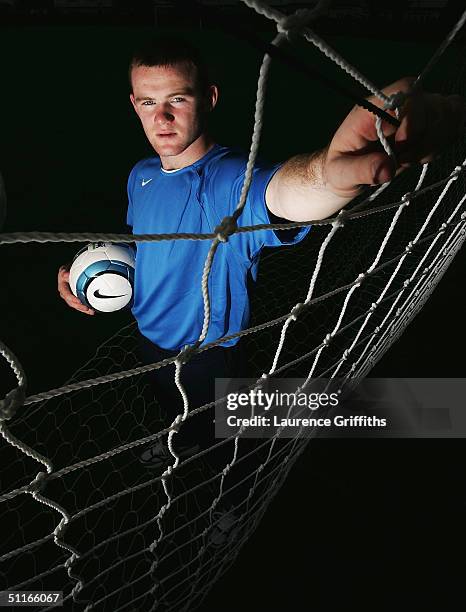 Everton and England Striker Wayne Rooney holds the New Nike Total 90 Aerow, the Official Ball of the Premiership for the 2004-2005 season at the...