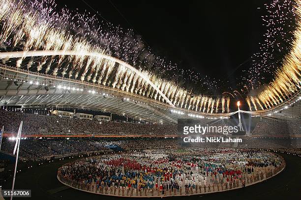 Fireworks are seen after the lighting of the cauldrom during the opening ceremony for the Athens 2004 Summer Olympic Games on August 13, 2004 at the...