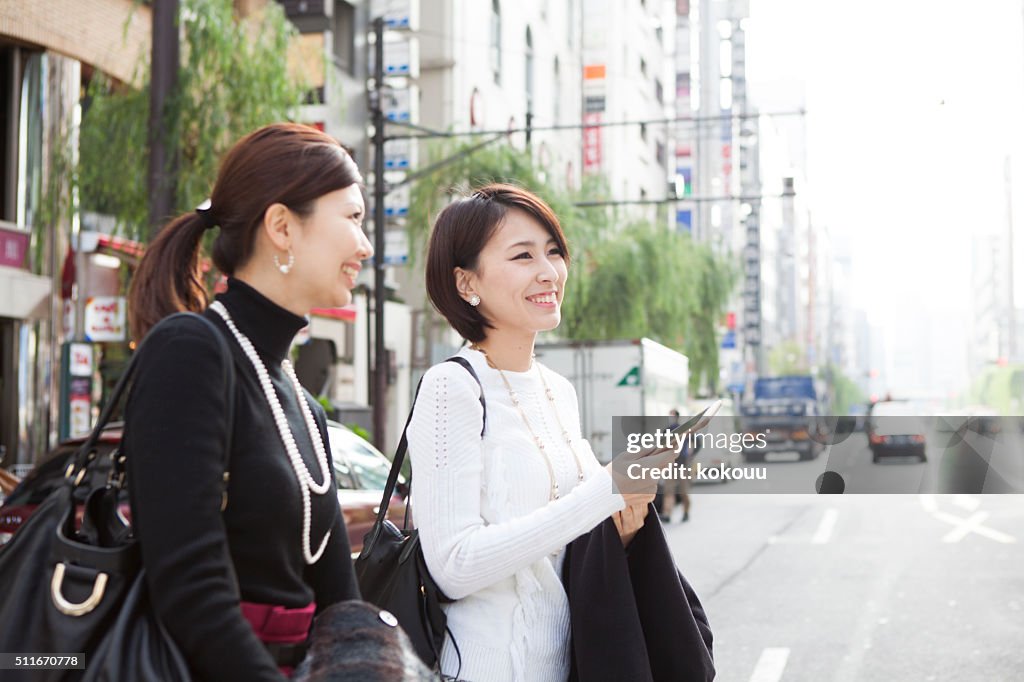 Women who are walking the modern town