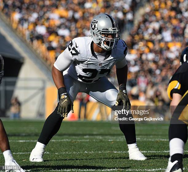 Safety Taylor Mays of the Oakland Raiders looks on from the field during a game against the Pittsburgh Steelers at Heinz Field on November 8, 2015 in...