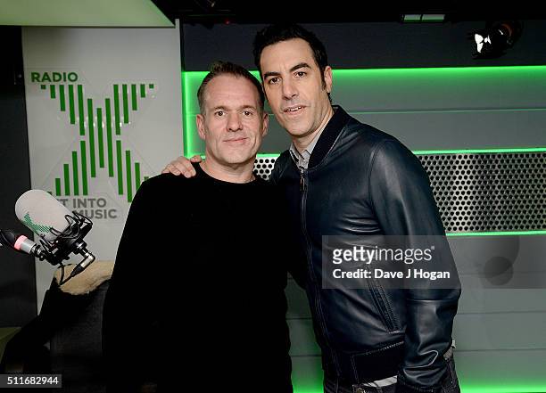 Chris Moyles with Sacha Baron Cohen at his surprise birthday party on Radio X at Global Radio Studios on February 22, 2016 in London, England.