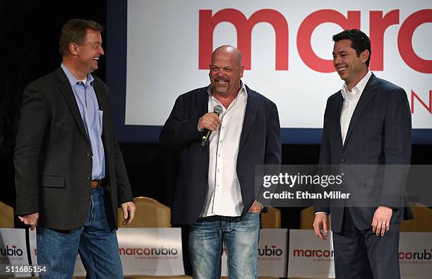 Sen. Dean Heller , Rick Harrison from History's "Pawn Stars" television series and U.S. Rep. Jason Chaffetz attend a rally for Republican...