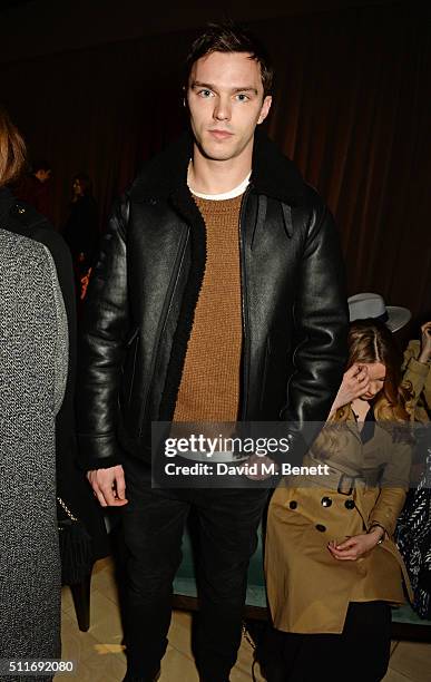 Nicholas Hoult wearing Burberry at the Burberry Womenswear February 2016 Show at Kensington Gardens on February 22, 2016 in London, England.