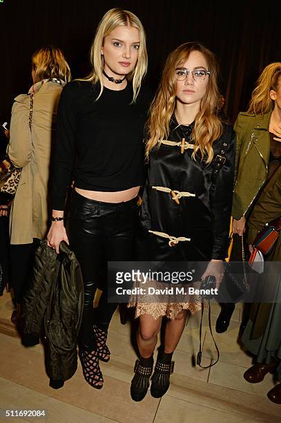 Lily Donaldson and Suki Waterhouse wearing Burberry at the Burberry Womenswear February 2016 Show at Kensington Gardens on February 22, 2016 in...