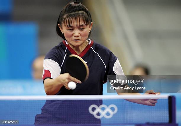 Tawny Banh of the United States hits a return during her victory over Ji Hye Yoon of Korea during the women's singles table tennis match on August...