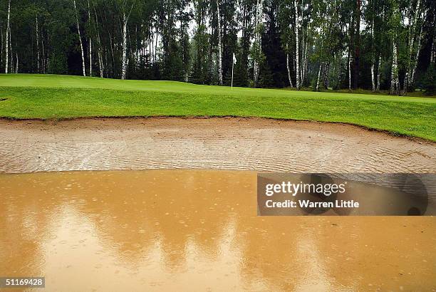 Plays has been abandoned as heavy rain floods the course during the third round of the BMW Russian Open at Moscow Golf and Country Club on August 14,...