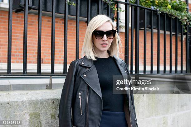 Teen Vogue Fashion News Director Jane Keltner De Valle wears a Mulberry jacket, Jason Wu top and Celine sunglasses on day 3 during London Fashion...