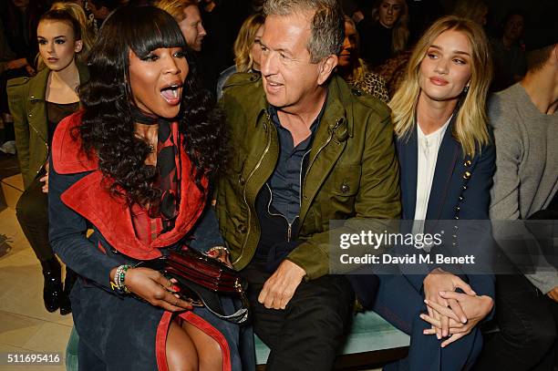 Naomi Campbell, Mario Testino and Rosie Huntington-Whiteley wearing Burberry at the Burberry Womenswear February 2016 Show at Kensington Gardens on...