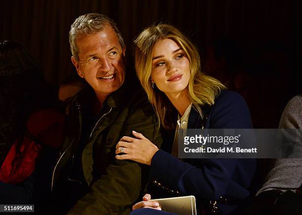 Mario Testino and Rosie Huntington-Whiteley wearing Burberry at the Burberry Womenswear February 2016 Show at Kensington Gardens on February 22, 2016...