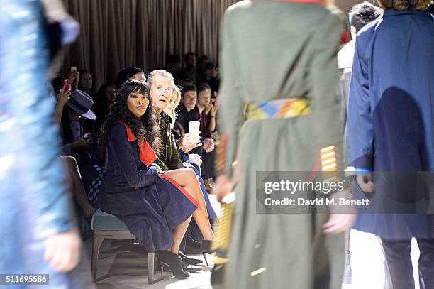 Naomi Campbell, Mario Tesino and Rosie Huntington-Whiteley wearing Burberry at the Burberry Womenswear February 2016 Show at Kensington Gardens on...